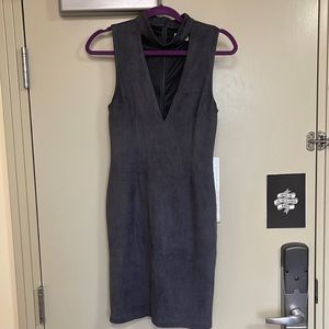 Grey suede mini-dress with choker detail and deep v.